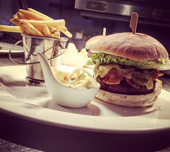 Burger and chips available at signatures restaurant