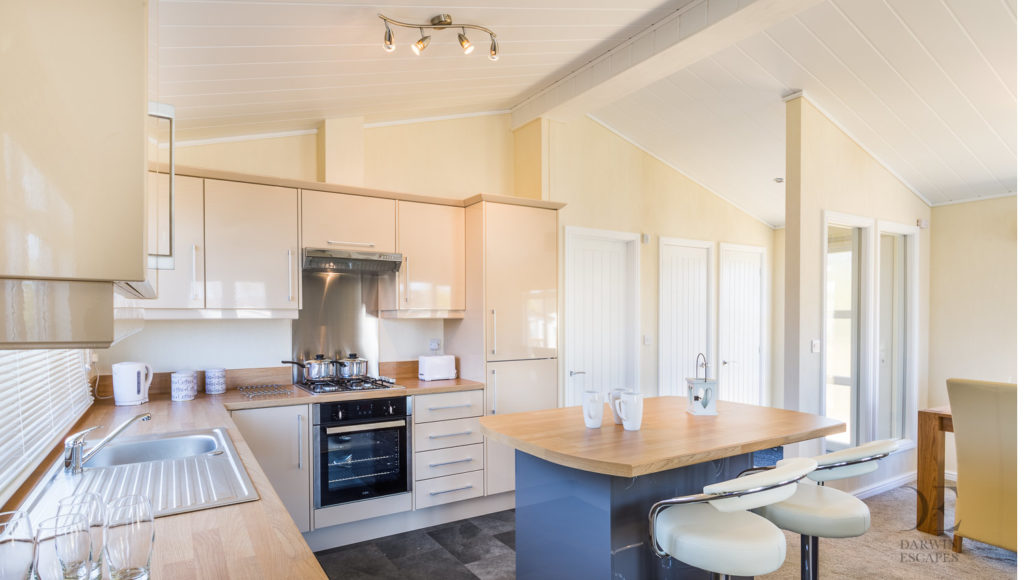 Interior shot of the kitchen in the Prestige Buckland Lodge