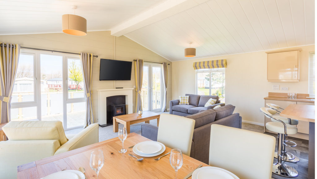 Interior shot of the dining area and lounge in the Prestige Buckland Lodge