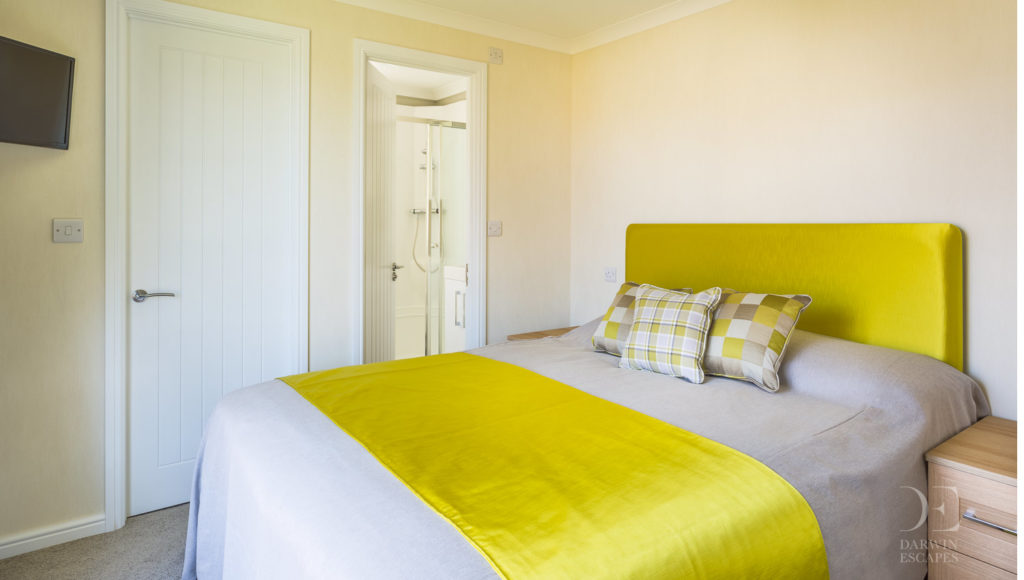 Interior shot of the master bedroom in the Prestige Buckland Lodge