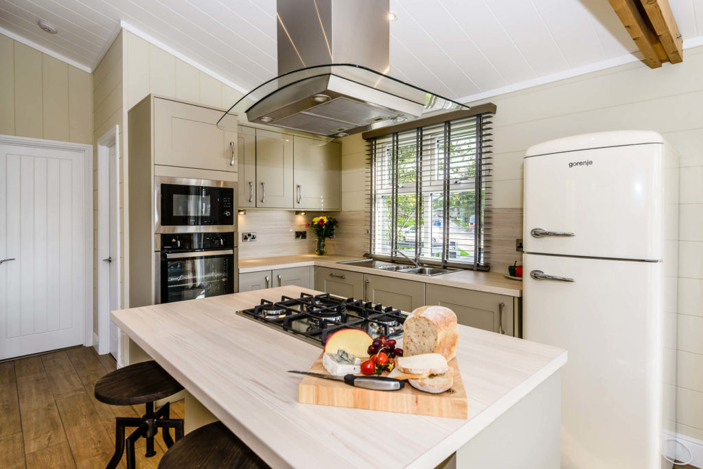 kitchen island with hob and loaf of bread 