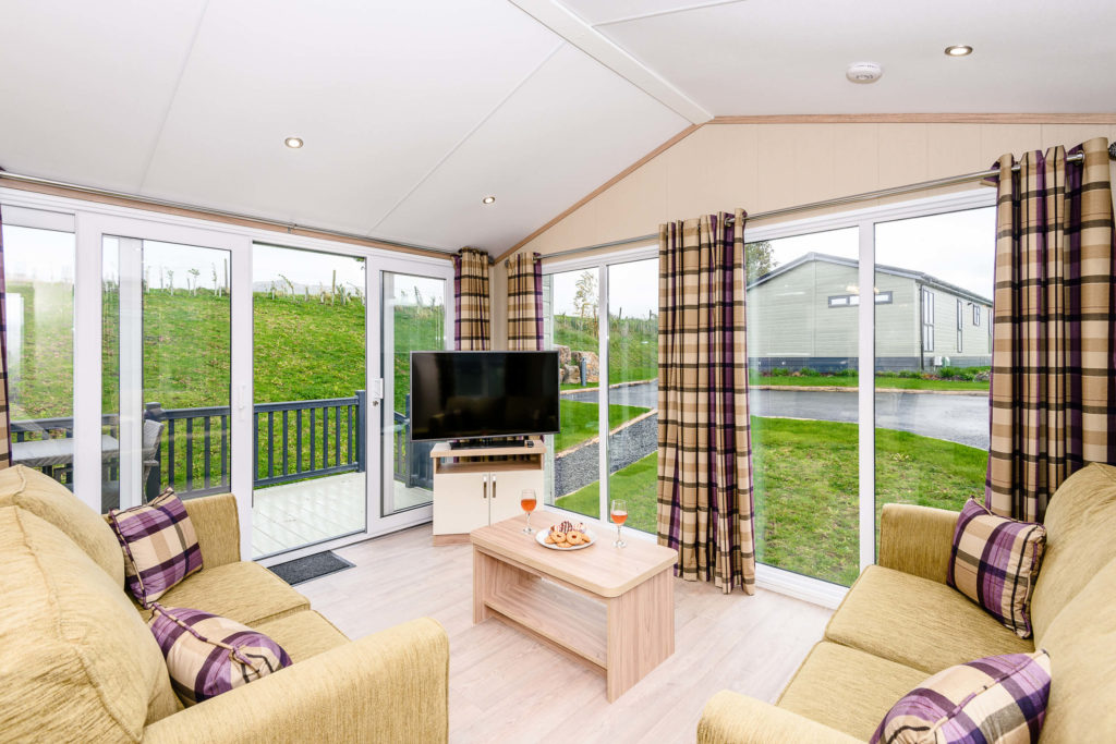 large corner windows in lounge of lodge