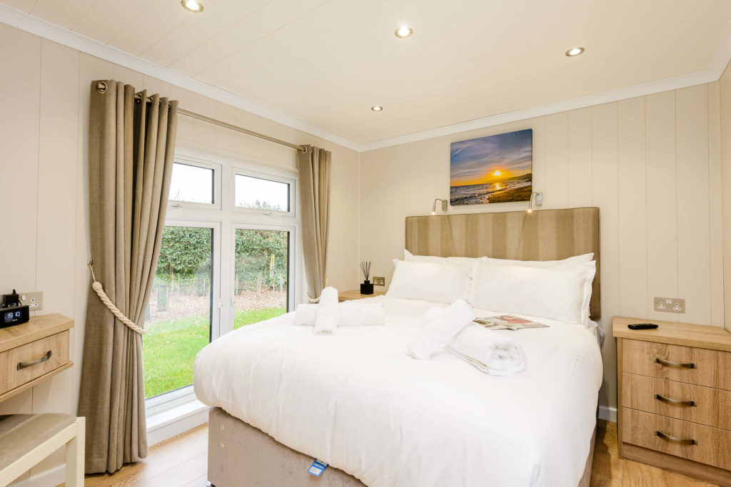 Master bedroom in a lodge at Wareham Forest