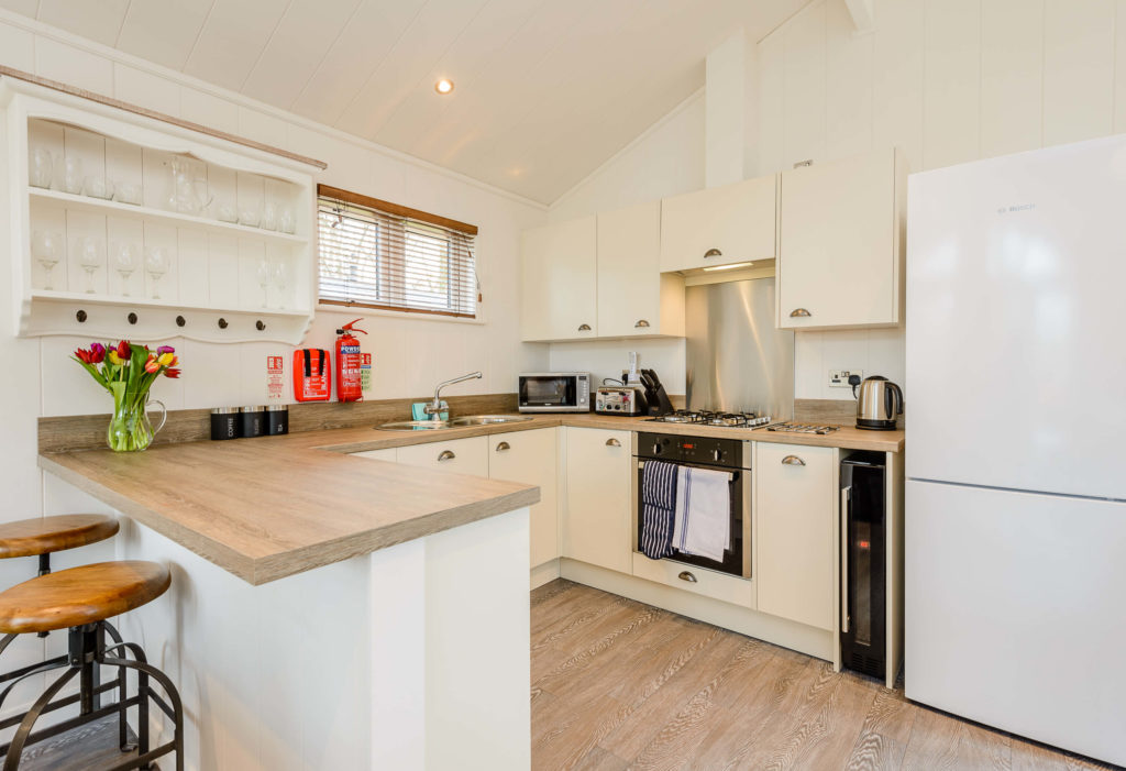 Interior shot of a kitchen in a lodge at Wareham Forest