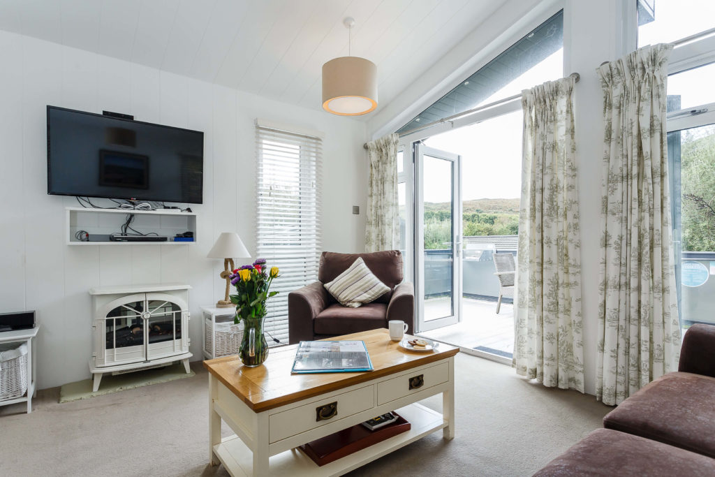 Interior shot of a lounge in a lodge at Mullion Cove