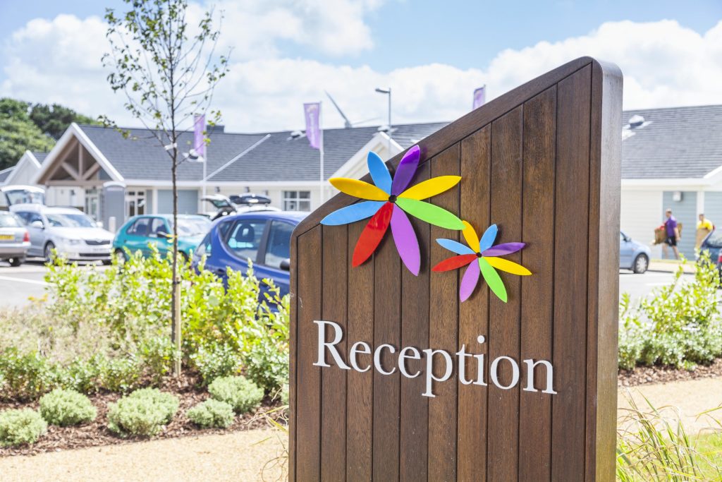 Reception sign post at Piran Meadows