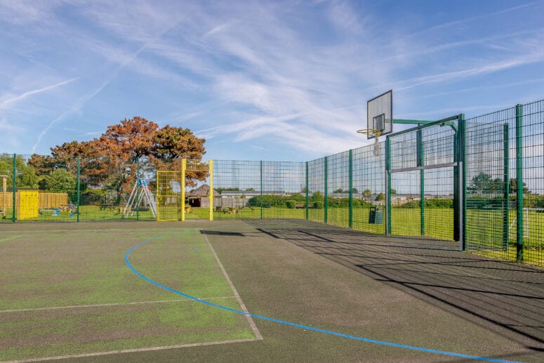 outdoor tennis and basketball court available at new pines, rhyl, north wales