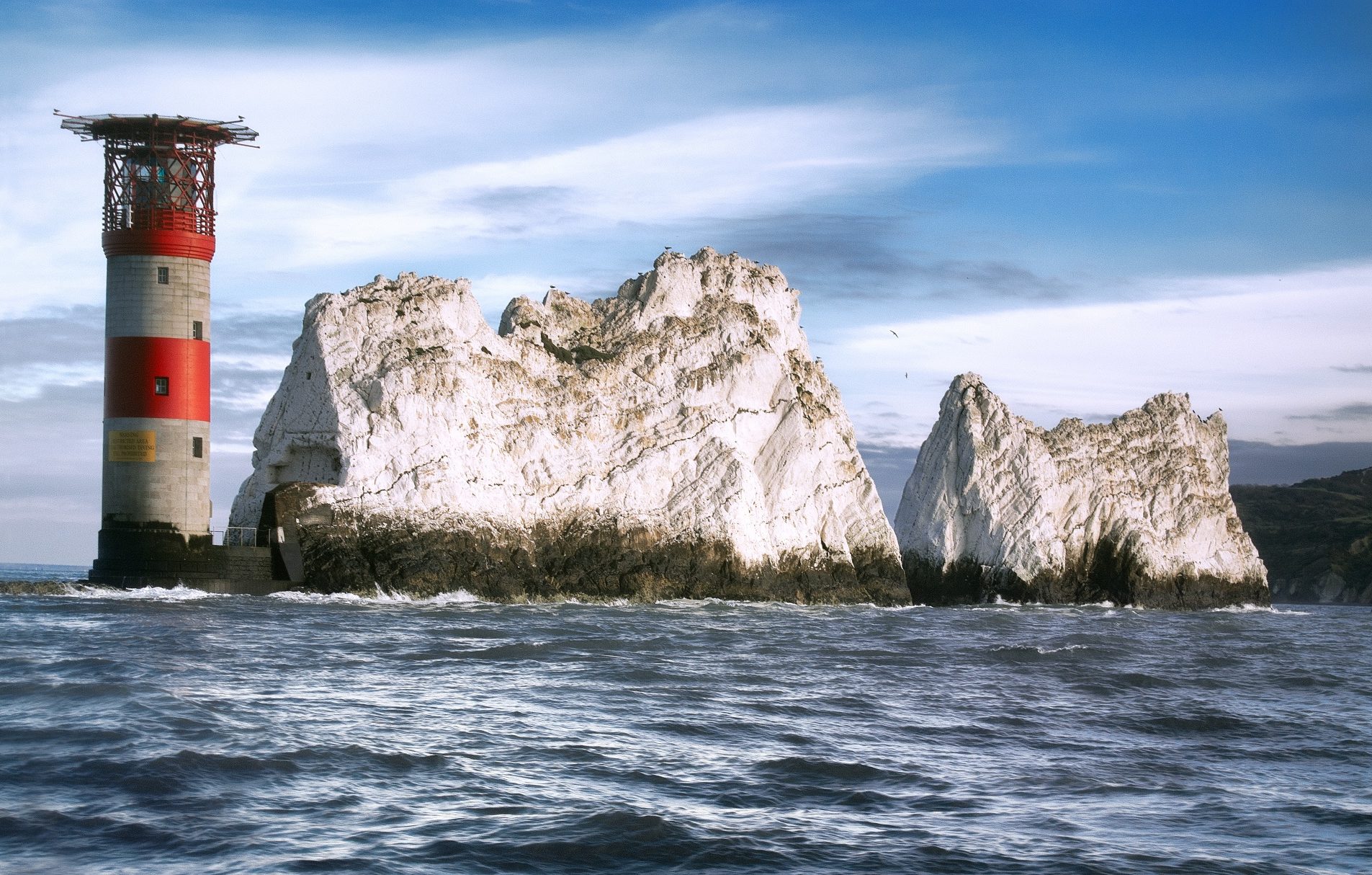 'needles' south coast rock formation and red lighthouse